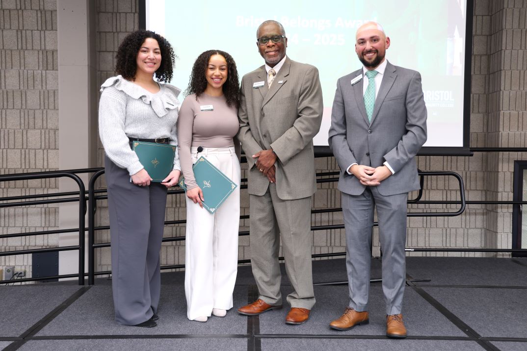 Alicia Lewis and Cassie Wilcox receiving awards at Bristol Excellence
