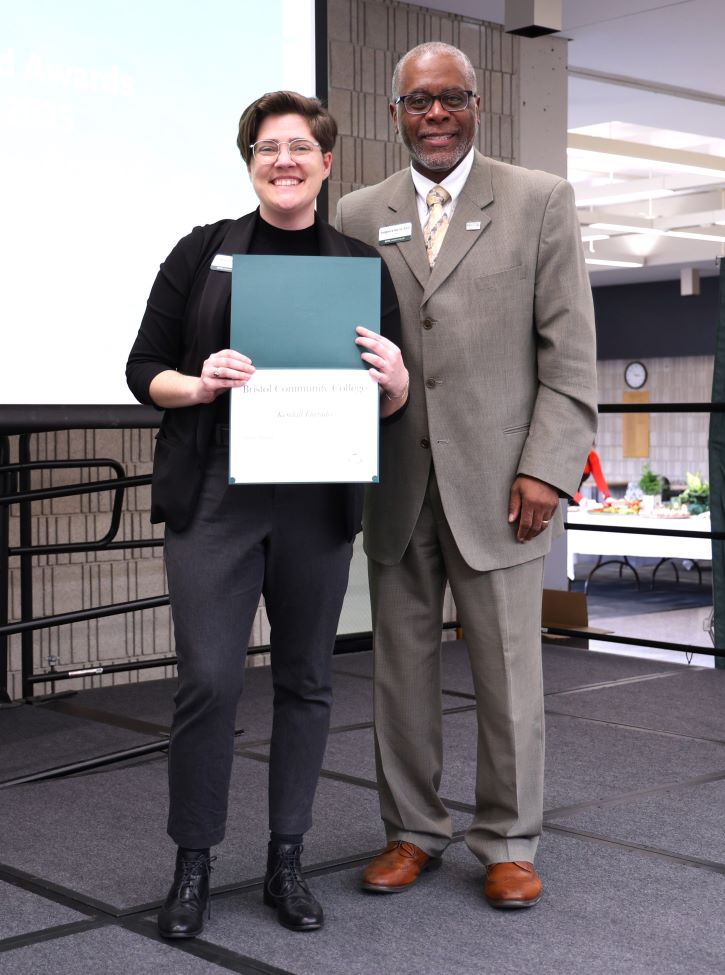 Kendall Furtado receiving a Silver Shield at Bristol Excellence