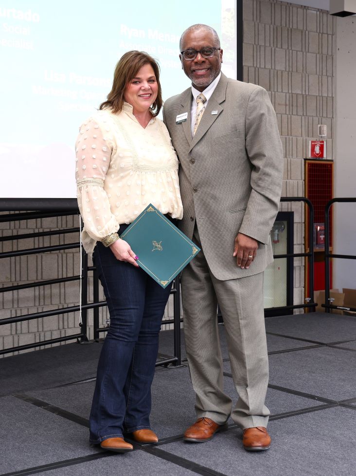 Lisa Parsons receiving a Silver Shield at Bristol Excellence