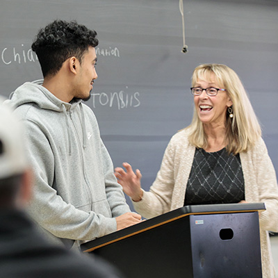 professor speaking with student