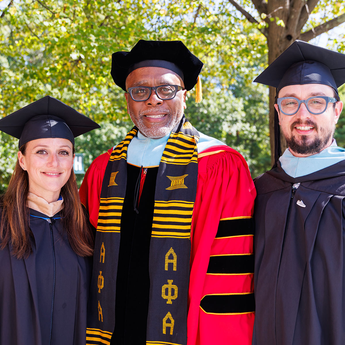 President Harris with speakers Alaina Marcotte and Mike Fox