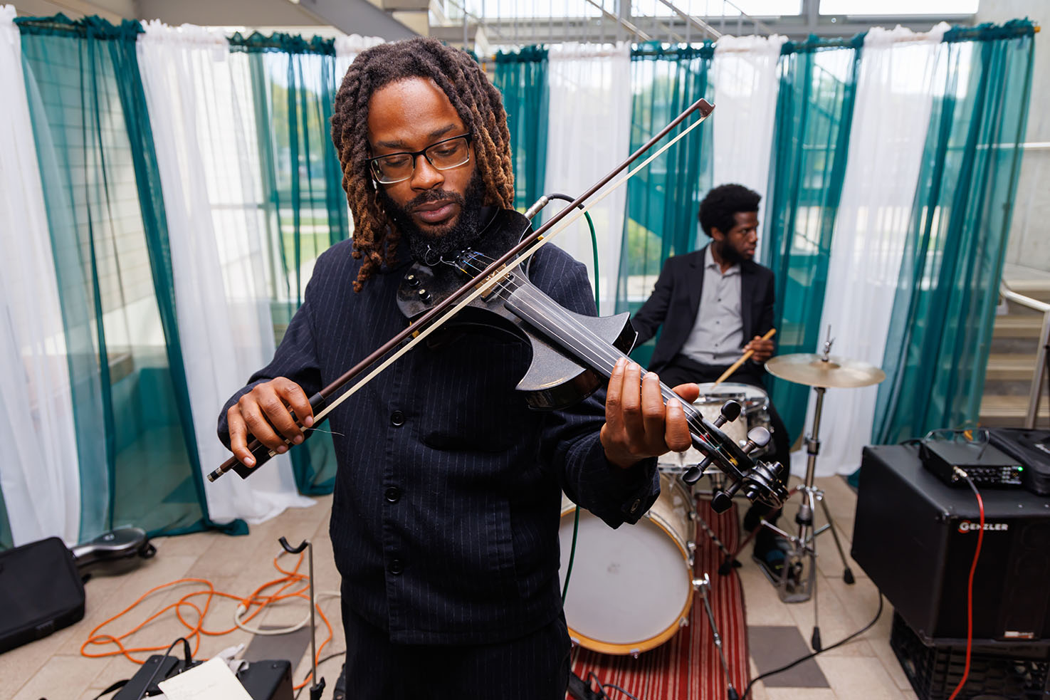 Jazz musician playing the violin at Bristol's Inauguration reception