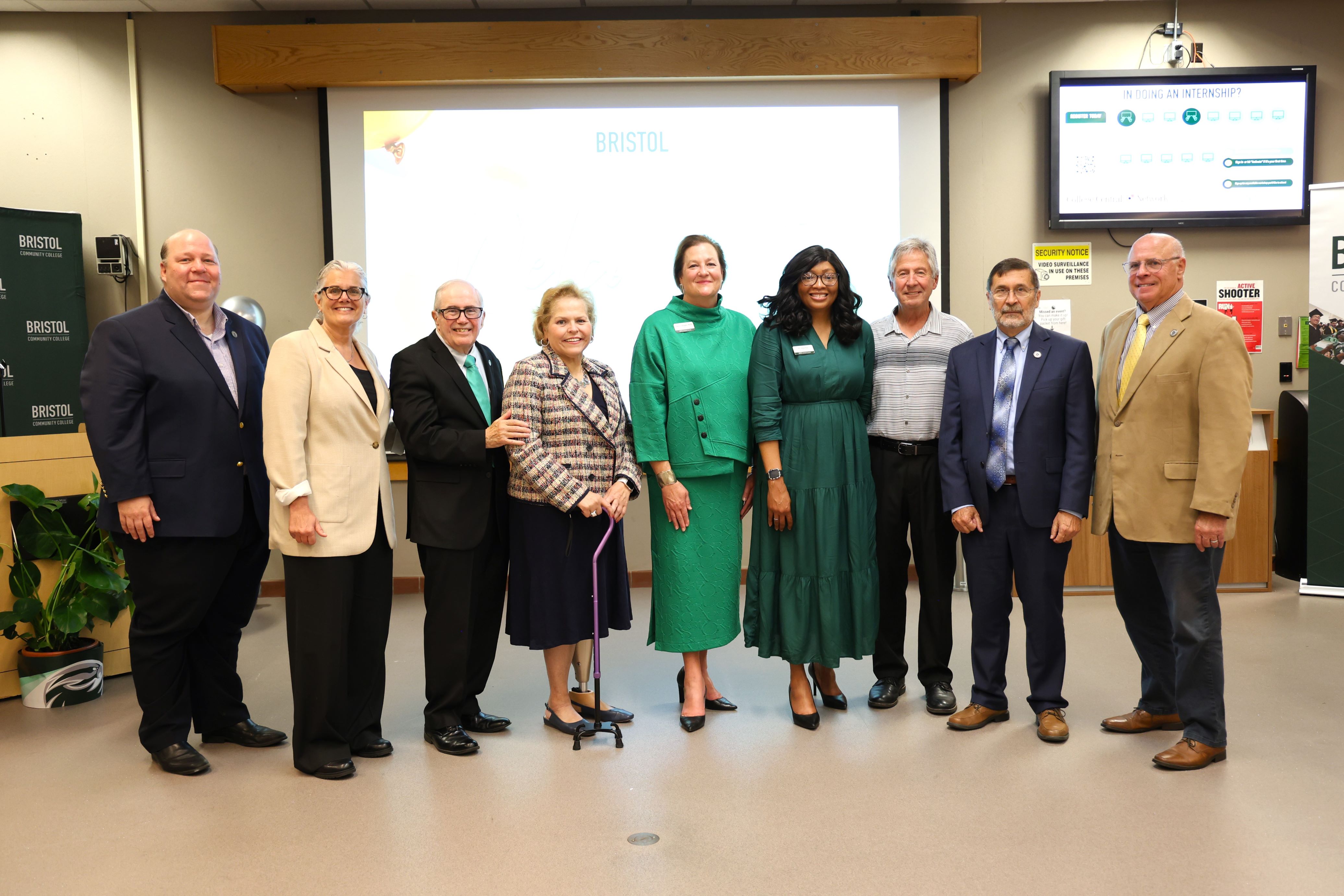 Paul Feeney, Massachusetts Senator; Cathleen DeSimone, Mayor of Attleboro; Dr. John J. Sbrega, President Emeritus; Joan M. Medeiros, Chair, Board of Trustees; Dr. Laura L. Douglas, President; Dr. Janet Ray, Dean, Attleboro Campus; Don Smyth, Former Chair of the Board of Trustees; James Hawkins, Massachusetts State Representative; Steven S. Howitt, Massachusetts State Representative