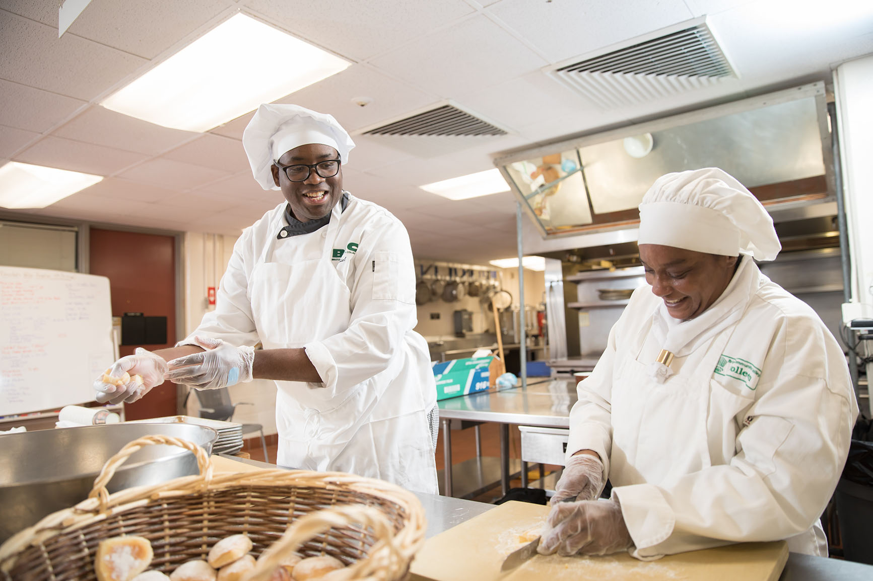 Culinary students working alongside each other