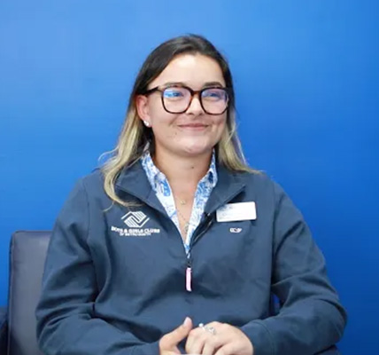 alumni wearing boys and girls club jacket