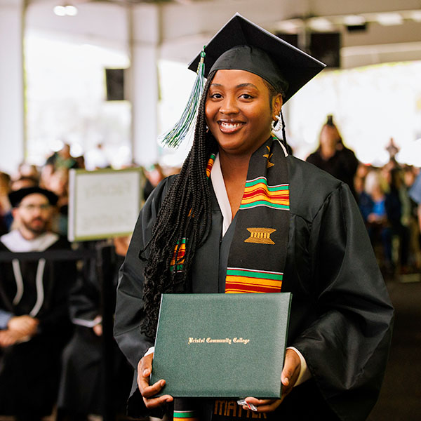 Graduate with diploma