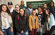 group of students standing in front of a Multicultural Student Center