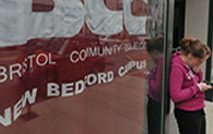 student outside New Bedford campus