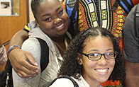 students smiling at camera