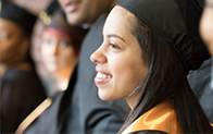 student in graduation cap and gown