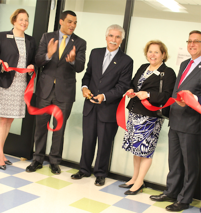 group of officials at ribbon cutting