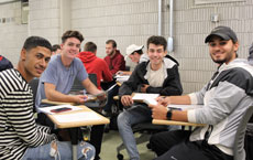 group of students meeting in classroom