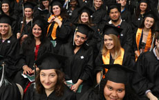 group of smiling graduates