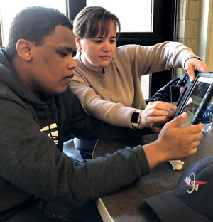 Student working with an instructor